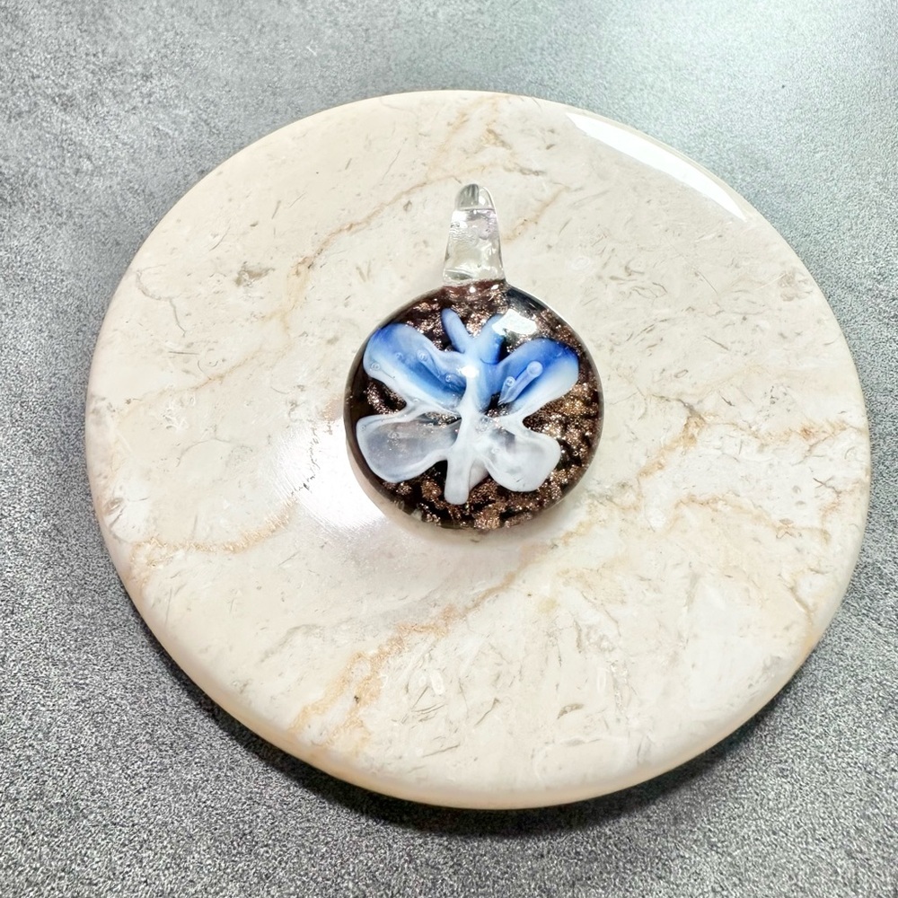 Round Art Glass Pendant With A Blue And White Butterfly